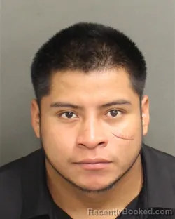 Mugshot of Jair Melqui Aguilar booked in Orange County, Florida on August 12, 2026