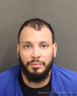 Mugshot of Joel Alberto Velezburgos booked in Orange County, Florida on August 12, 2026