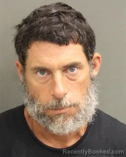 Mugshot of Enrique B Develasco booked in Orange County, Florida on August 12, 2026