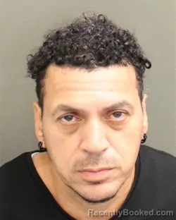 Mugshot of Daniel Herminio Jr Lebron booked in Orange County, Florida on August 12, 2026