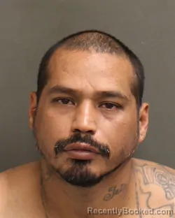 Mugshot of Rodolfo Jr Garcia booked in Orange County, Florida on August 12, 2026