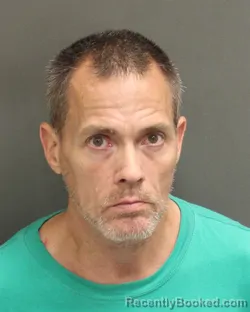 Mugshot of Johnathon Lee Burton booked in Orange County, Florida on August 13, 2026