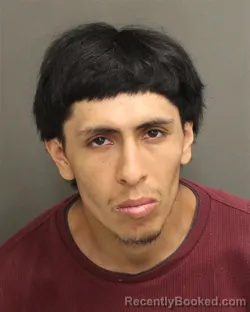 Mugshot of Axel Jogary Acevedoneito booked in Orange County, Florida on August 13, 2026