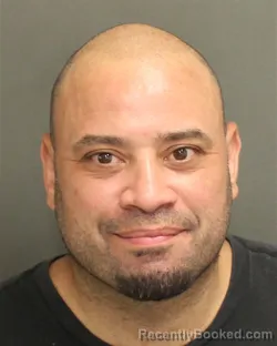 Mugshot of Joel Elias Disanto booked in Orange County, Florida on August 13, 2026