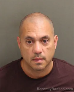 Mugshot of Raymond Iv Gomez booked in Orange County, Florida on August 14, 2026
