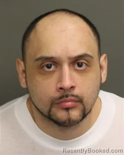 Mugshot of Gabriel Eduardo Roman booked in Orange County, Florida on August 14, 2026