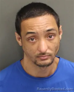 Mugshot of Domonique Miquel Xavie Rowe booked in Orange County, Florida on August 14, 2026