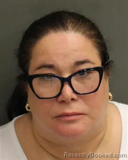 Mugshot of Antonietta Rinaldi Prado booked in Orange County, Florida on August 14, 2026