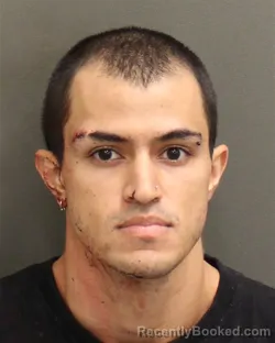 Mugshot of Julian Leander Munoz booked in Orange County, Florida on August 14, 2026