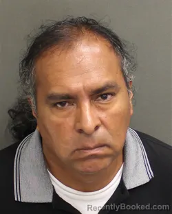 Mugshot of Jorge Orlando Agredochambo booked in Orange County, Florida on August 14, 2026