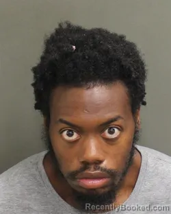 Mugshot of Claudius Aribigbola Jr Adegbuyi booked in Orange County, Florida on August 14, 2026