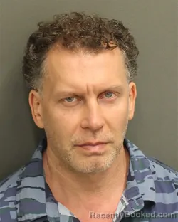 Mugshot of Dmitri Nilolayevich Pridannikov booked in Orange County, Florida on August 15, 2026