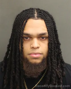 Mugshot of Kenson Travis Alfred booked in Orange County, Florida on August 16, 2026