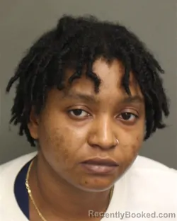 Mugshot of Dominique Janine Janvier booked in Orange County, Florida on August 16, 2026