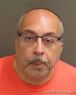 Mugshot of Amir Ali Hassania booked in Orange County, Florida on August 16, 2026