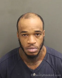 Mugshot of Jestin Booker Cleveland booked in Orange County, Florida on August 17, 2026