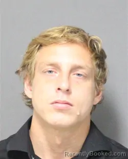 Mugshot of Donovan Leif Hostetter booked in Orange County, Florida on August 17, 2026