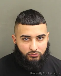 Mugshot of Aiman Walid Masoud booked in Orange County, Florida on August 17, 2026