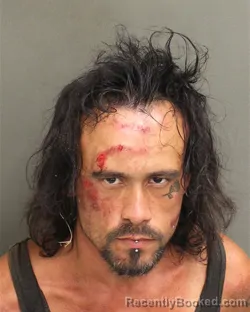 Mugshot of Dustin Bernnel Leija booked in Orange County, Florida on August 17, 2026