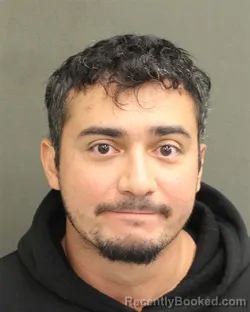 Mugshot of Carlos Javier Veyna booked in Orange County, Florida on August 18, 2026