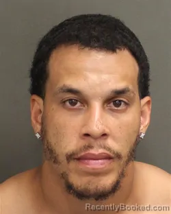 Mugshot of Hassan Abdul Concepcion booked in Orange County, Florida on August 18, 2026