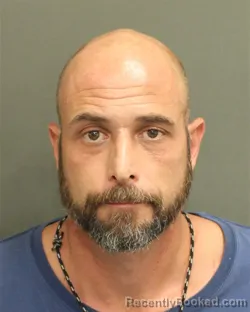 Mugshot of Jason Michael Salustro booked in Orange County, Florida on August 19, 2026