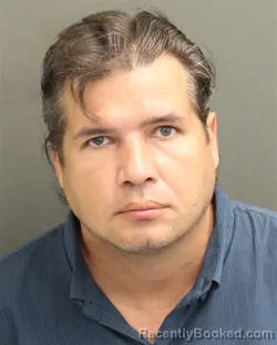 Mugshot of Alexey Sergeyevich Gavrilov booked in Orange County, Florida on August 19, 2026