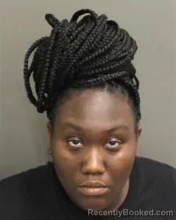 Mugshot of Shantoria Tylandraashu Harris booked in Orange County, Florida on August 20, 2026