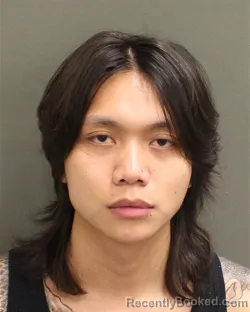 Mugshot of Giang Truong Pham booked in Orange County, Florida on August 21, 2026