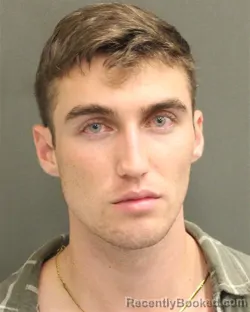 Mugshot of Austin Matthew Bowles booked in Orange County, Florida on August 21, 2026