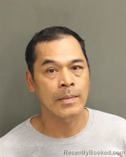Mugshot of Mai Thanh Nguyen booked in Orange County, Florida on August 21, 2026