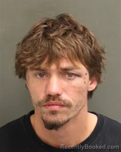 Mugshot of Adrian Paul Martin Smith booked in Orange County, Florida on August 22, 2026