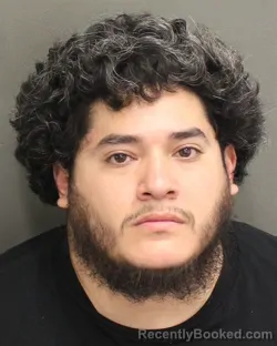 Mugshot of Julio Jr Ramirez booked in Orange County, Florida on August 22, 2026