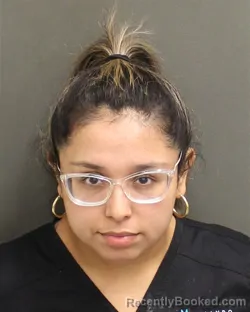 Mugshot of Devely Aile Ayala booked in Orange County, Florida on August 22, 2026