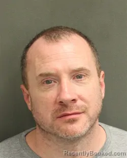 Mugshot of Johnathan Bryan Sims booked in Orange County, Florida on August 22, 2026