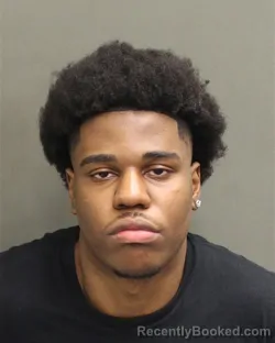Mugshot of Joshua Dominique Dupey booked in Orange County, Florida on August 22, 2026