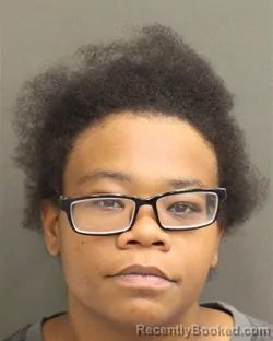 Mugshot of Alexis Britannya Burke booked in Orange County, Florida on August 22, 2026