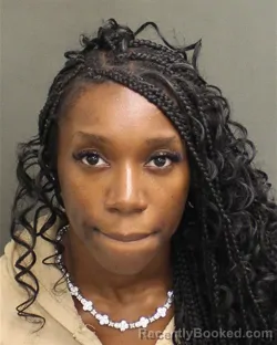 Mugshot of Claudjina Frederick booked in Orange County, Florida on September 10, 2026