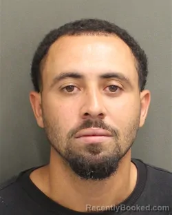 Mugshot of Joshua Miguel Ovallescruz booked in Orange County, Florida on September 11, 2026