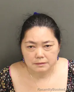 Mugshot of Weizhen Jin booked in Orange County, Florida on September 15, 2026