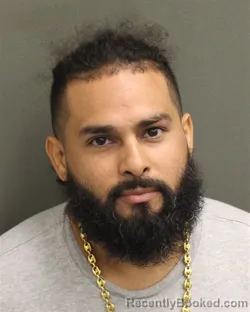 Mugshot of Alfredo Juan Crispin booked in Orange County, Florida on September 22, 2026