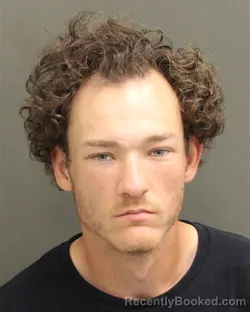 Mugshot of Alex Andrew Aldridge booked in Orange County, Florida on September 23, 2026