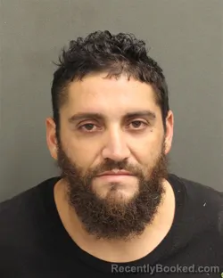 Mugshot of Carlos Alberto Moralesjimenez booked in Orange County, Florida on September 26, 2026
