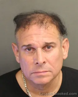 Mugshot of Eduardo A Munizcruz booked in Orange County, Florida on September 27, 2026