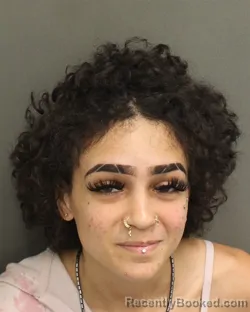 Mugshot of Isabella Aundres Desi Acevedo booked in Orange County, Florida on September 27, 2026