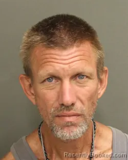 Mugshot of Aaron Michael Kidd booked in Orange County, Florida on September 27, 2026