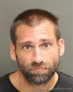 Mugshot of Travis Bradley Costello booked in Orange County, Florida on September 28, 2026