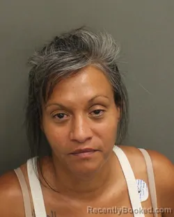 Mugshot of Betsey Ann Puerta booked in Orange County, Florida on October 1, 2026