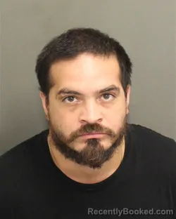 Mugshot of Carlos Alberto Ortiz booked in Orange County, Florida on October 1, 2026