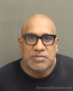 Mugshot of Carlos Miguel Guerrero booked in Orange County, Florida on October 1, 2026